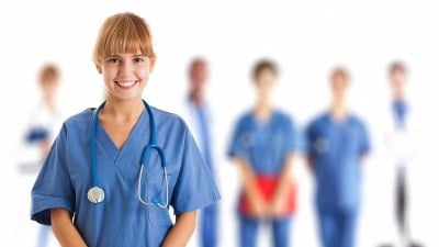 Group of medical assistant students in scrubs, representing Ohio-based medical assistant programs.